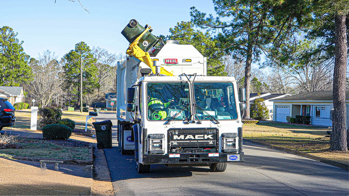 Heil side load garbage trucks